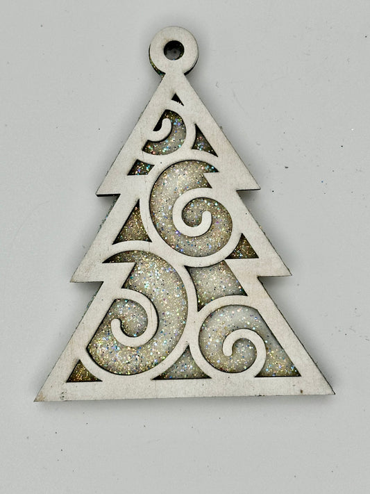 Wooden tree ornament with swirl detail